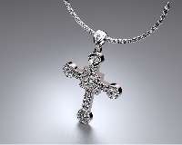 Custom cross necklace in sterling silver with diamonds.