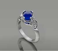 Woman's ring in white gold displaying a blue sapphire.